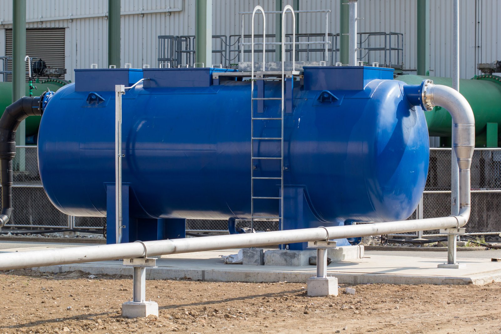 Oil barrels blue or chemical drums horizontal